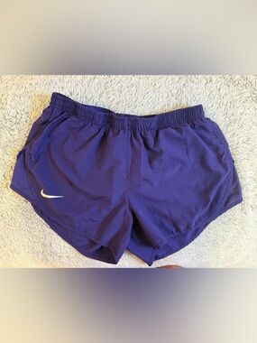 Nike Women's Purple Athletic Shorts with White Swoosh